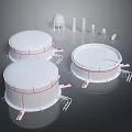 Large White Storage Tanks With Support Structures And Small Towers