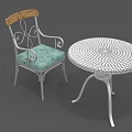 Modern Metal Frame Chair With Curved Armrests Wooden Backrest Turquoise Cushion And Round Mesh Table