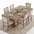 Wooden Dining Table Set With Beige Cushioned Chairs And Candle Holders Fruits Wine Glasses