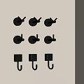 Modern Black Wall Hooks With Different Designs On Beige Wall For Home Decor