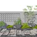 Gray Garden Wall with Circular Hollow Design Green Plants and Stone Path