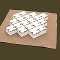 White Cubes Neatly Arranged On Brown Burlap Cloth With Dark Brown Background
