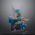 Blue Haired Fairy Figurine Sitting On Decorative Box With Blue Wings And Feathers