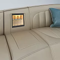 Modern Curved Sectional Sofa With Beige Upholstery Blue Cushions And Grid Pattern