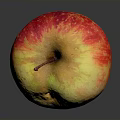 Fresh Ripe Yellow And Red Apple With Small Spot On Dark Background And Reflection