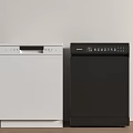 White And Black Dishwashers Kitchen Appliances Side By Side On Wooden Floor Against Light Wall