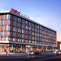 Modern Hydee International Trade Mall Exterior With Storefronts Entrance And Parking Area