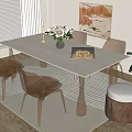 Modern White Dining Table Set With Transparent Acrylic Chairs And Floral Arrangement