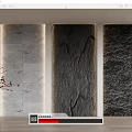 Decorative Ornament Set With Black Vase Red Branches On Side Table Against Textured Stone Walls