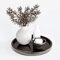 White Vase With Brown Flowers On Black Tray Including Small White Bottle And Bowl