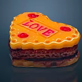 Heart shaped Decorative Item With Orange Glaze LOVE Text And Red Accents