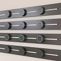 Modern Black Switch Panels With Round Sockets And LED Indicator Lights Neatly Arranged