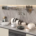 Organized Kitchen Wall With Spice Rack Hanging Utensils Knives Countertop Pots And Frying Pan