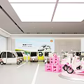Spacious Bright Electric Vehicle Specialty Store With Pink Decor And Multiple Models