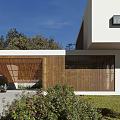 Modern White Detached Villa With Lush Trees Black Car And Stone Steps