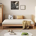 Two Seater Beige Sofa With Wooden Frame Black White Brown Pillows Throw Blanket And Wooden Floor