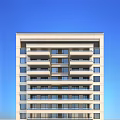 Modern Residential Building With Multiple Balconies Neatly Arranged Windows Light Colored Facade Against Blue Sky