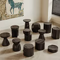 Multiple Dark Wooden Stools With Various Designs In A Room 3d model