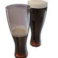 Two Tall Clear Glasses Filled With Dark Beverage And Foam Top