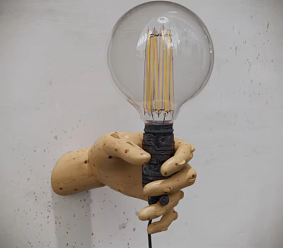 Hand Shaped Wooden Wall Lamp With Transparent Glass Bulb And Filament On White Wall 3d model
