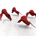 Four Red Cloak Shaped Decorative Items Floating On White Surface