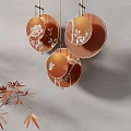 Stylish Circular Chandelier With Orange Shade Floral Patterns Gold Frame And Red Leaf Branch
