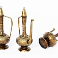 Vintage Brass Teapots Featuring Intricate Carvings Three Pieces