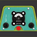 Retro Electronic Device With Green Orange Casing Gauge Knobs Red Button And Slots
