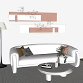 White Sectional Sofa With Throw Pillows Green Plants And Floor Lamp In Modern Living Room