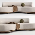 Modern Beige Upholstered Sectional Sofa With Wooden Base Throw Blanket And Decorative Ball