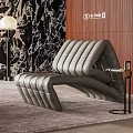 Modern Gray Leather Lounge Chair With Striped Design On Rug And Abstract Wall