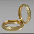 Two Elegant Gold Bracelets With Hammered Textured Surface And Shiny Metallic Look