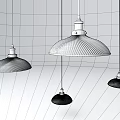 Multiple Modern Pendant Lights With Glass Shades And Brass Bases For Interior Design
