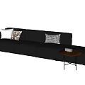 L Shaped Black Leather Sectional Sofa With Decorative Pillows And Side Coffee Table