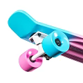 Skateboard Sports Equipment With Colorful Rainbow Gradient Design Blue Pink Wheels And Textured Deck