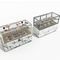 Transparent Glass Display Shelves For Bakery Shops Showcasing Fresh Pastries With Sturdy Marble Patterned Base