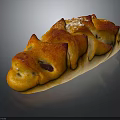 Artisan Braided Bread With Golden Brown Crusty Surface Topped With Sesame Seeds And Raisins