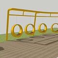 Outdoor Playground Equipment With Yellow Metal Frame And Hanging Ring Swings