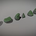 Natural Green Stone Specimens with Various Shapes Sizes Arranged in Row for Decoration