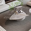 Modern Irregular Design Coffee Table With Marble Top And Green Plant Near Sofa On Striped Rug