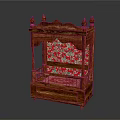 Traditional Chinese Wooden Bed With Carved Design Decorative Spires And Red Floral Fabric