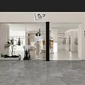 Modern Clothing Store Interior With Mannequins Wearing Dresses And Hanging Clothes Racks