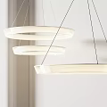 Three Modern White Circular Pendant Lights Hanging In Interior Design 3d model