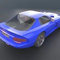 Blue Sports Car With Streamlined Design And Sleek Exterior Features