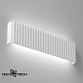 Modern White Wall Light With Vertical Stripes Design Illuminated On Wall