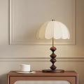 Elegant Table Lamp With Spiral Wooden Base And White Pleated Lampshade On Bedside Table