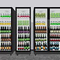 Three Glass Door Display Refrigerators With Neatly Arranged Cold Beverages