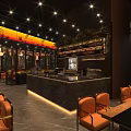 Modern Upscale Restaurant Interior With Warm Ambient Lighting Complete Bar And Comfortable Dining Seats