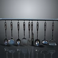 Silver Kitchen Utensils with Black Handles Hanging on Metal Rod Dark Reflective Background