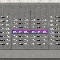 Clothing Store Shoe Display Wall With Neatly Arranged Shoes And Pink Highlighted Sections
